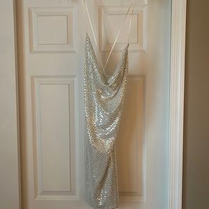 White and silver mini dress with cowl neckline and low back